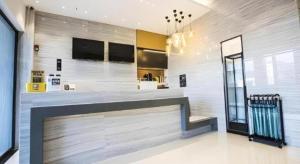 TV a/nebo společenská místnost v ubytování City Comfort Inn Nanchang Fuxing Avenue East Metro Station Xiaolan