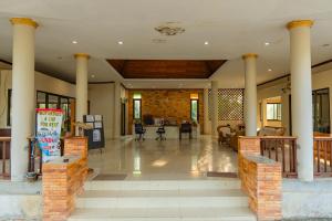 a large lobby with columns and a lobby with a lobby at Dream Team Beach Resort in Ko Lanta +140 photos