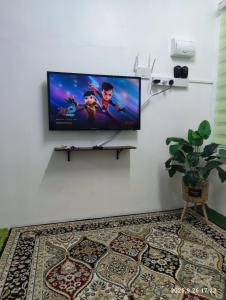 Et tv og/eller underholdning på 28 Pauh Indah Homestay