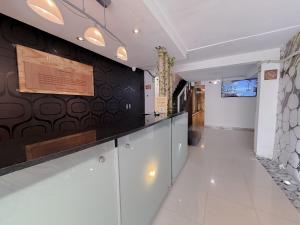 TV a/nebo společenská místnost v ubytování Rustic Hotel Isla Mujeres