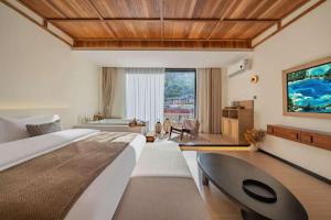 Ένα ή περισσότερα κρεβάτια σε δωμάτιο στο Wild Twilight Mountain Homestay