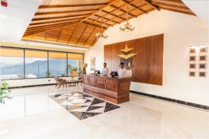 Lobbyen eller receptionen på Mankamana Hillcrest Resort + 33 billeder
