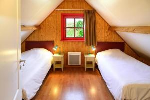 Ένα ή περισσότερα κρεβάτια σε δωμάτιο στο Wooden Chalet in Abbeville near Somme Bay +22 φωτογραφίες