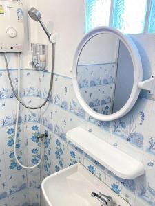 Koupelna v ubytování Le Moon Hotel