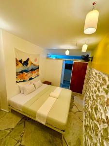 Postel nebo postele na pokoji v ubytování Lonos Circle Terrace view