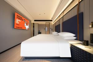 Imagem da galeria de FunGeeX Hotel Qingdao Zhengyang Middle Road MixC Store em Qingdao