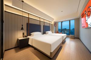 Imagem da galeria de FunGeeX Hotel Qingdao Zhengyang Middle Road MixC Store em Qingdao