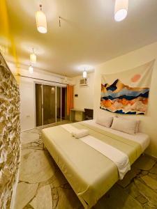 Postel nebo postele na pokoji v ubytování Lonos Circle Terrace view