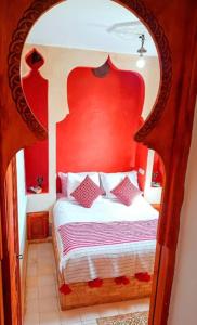 Ένα ή περισσότερα κρεβάτια σε δωμάτιο στο Iyado