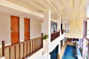 TV a/nebo společenská místnost v ubytování Na Tubthieng Boutique Resort Trang