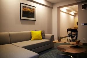 a living room with a couch and a table at Tophane Suites in Istanbul