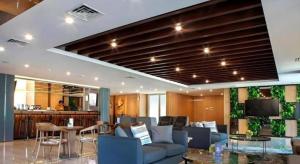 Χώρος καθιστικού στο Hotel Dafam Pacific Caesar