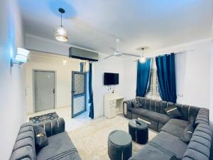 TV a/nebo společenská místnost v ubytování nile shores hotel