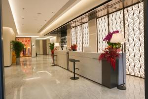 een lobby van een hotel met een receptie bij Xi'an Yunzhi Hotel in Xi'an