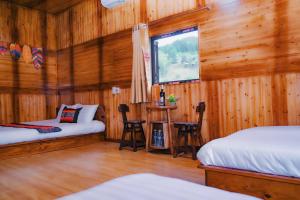 Postel nebo postele na pokoji v ubytování Bắc Hà Green Homestay