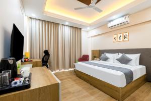 TV/trung tâm giải trí tại Limewood Signature - Huda City Centre