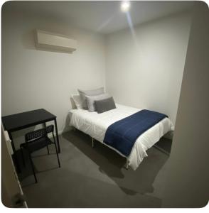 Кровать или кровати в номере Melbourne Star