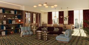 una sala de estar con un sofá y sillas en Roswyn, a Morgans Originals hotel, en Bombay