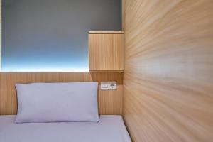 Postel nebo postele na pokoji v ubytování Sky Sleepbox