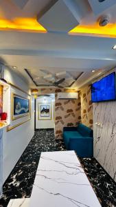 TV a/nebo společenská místnost v ubytování Hotel Lotus Lide