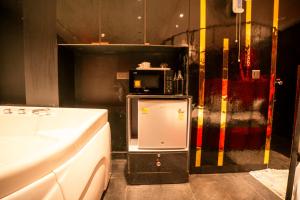 Η κουζίνα ή μικρή κουζίνα στο Orsom Stays Sassy - Sector 42