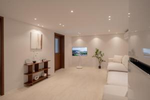 Televiisor ja/või meelelahutuskeskus majutusasutuses 하루재 명동 Harujae Myeongdong