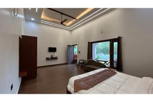 Μια τηλεόραση ή/και κέντρο ψυχαγωγίας στο Earthome Pilibhit Tiger Reserve