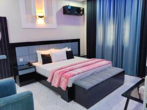 Ένα ή περισσότερα κρεβάτια σε δωμάτιο στο Shelton Elite Hotel