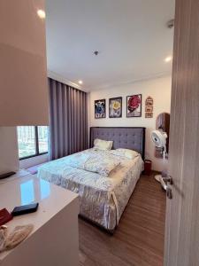 Una cama o camas en una habitación de Wican Homestay Apartment