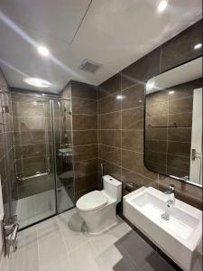 Un baño de Wican Homestay Apartment 8 fotos más