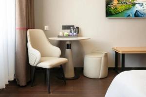 Fotografie z fotogalerie ubytování Huanyang Hotel Qingdao Chengyang Youth Football Stadium Branch v destinaci Liuting