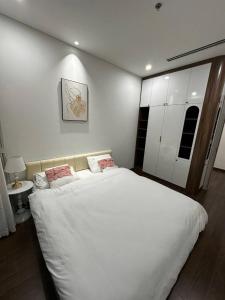 Una cama o camas en una habitación de Wican Homestay Apartment