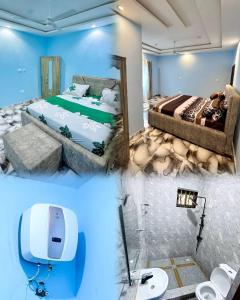 Camera blu con letto e lavandino di G v Homes and apartments a Gbawe