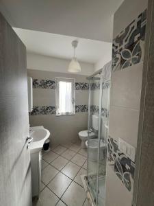 Koupelna v ubytování Agherè