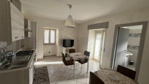 Kuchyň nebo kuchyňský kout v ubytování Agherè