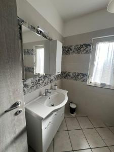 Koupelna v ubytování Agherè