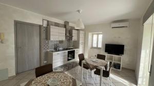 Kuchyň nebo kuchyňský kout v ubytování Agherè