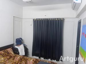 En eller flere senge i et værelse på sea villa