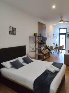 Кровать или кровати в номере Apartamento Ballena +7 фотографий