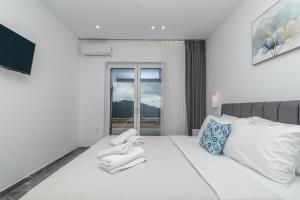 Ένα ή περισσότερα κρεβάτια σε δωμάτιο στο Villa Orizzonte - Ground Floor Apartment