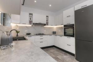 Η κουζίνα ή μικρή κουζίνα στο Villa Orizzonte - Ground Floor Apartment