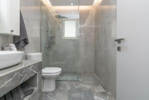 Ένα μπάνιο στο Villa Orizzonte - Ground Floor Apartment