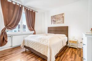 Postel nebo postele na pokoji v ubytování Wohnungen am Hagener Hbf