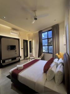 Ένα ή περισσότερα κρεβάτια σε δωμάτιο στο AV The Fun Destination +11 φωτογραφίες