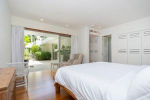 Ένα ή περισσότερα κρεβάτια σε δωμάτιο στο Villa Layan C - 3BR Villa with Private 20m Pool and Large Garden +26 φωτογραφίες