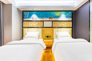 Ένα ή περισσότερα κρεβάτια σε δωμάτιο στο Star Dream Hotel +25 φωτογραφίες