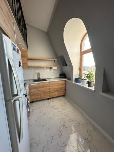 Φωτογραφία από το άλμπουμ του Уютный лофт σε Xirdalan