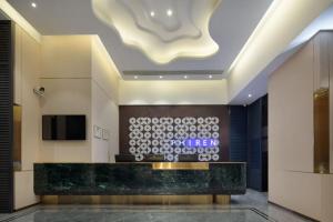 Лобби или стойка регистрации в PHIREN Hotel West Meixi Lake Metro Station, Changsha