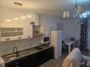 Η κουζίνα ή μικρή κουζίνα στο El capricho de Olga +4 φωτογραφίες