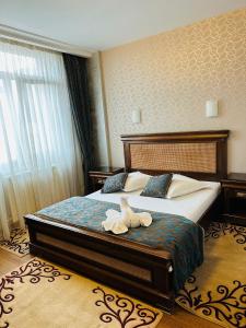 Postel nebo postele na pokoji v ubytování Acapulco Hotel